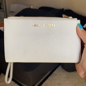 Cream Michael Kors wallet wristlet